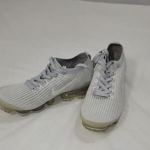 Nike Gray and White Sneakers Mesh Upper Streamlined Design